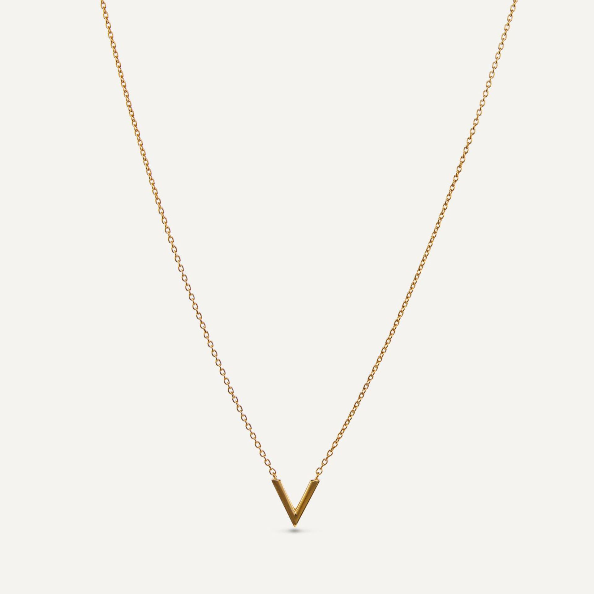 Goldene Gliederkette; in der Mitte wird die Kette durch ein "V" verbunden;