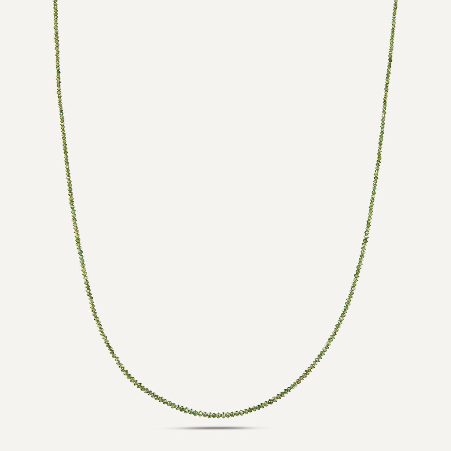 Collier aus direkt aneinander gereihten, sehr kleinen, runden, grünen Diamanten;
